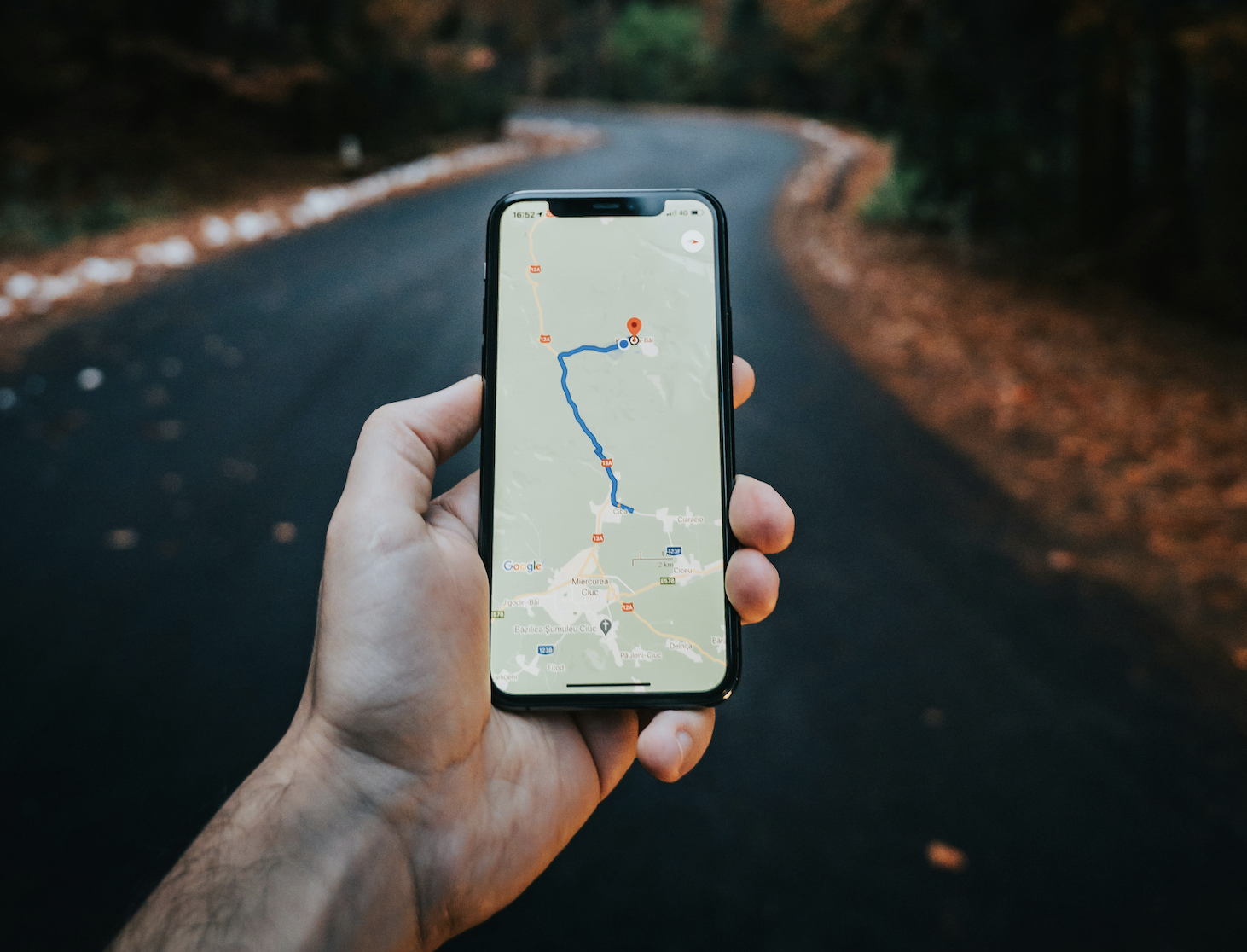 Phone showing a mapped-out trip plan